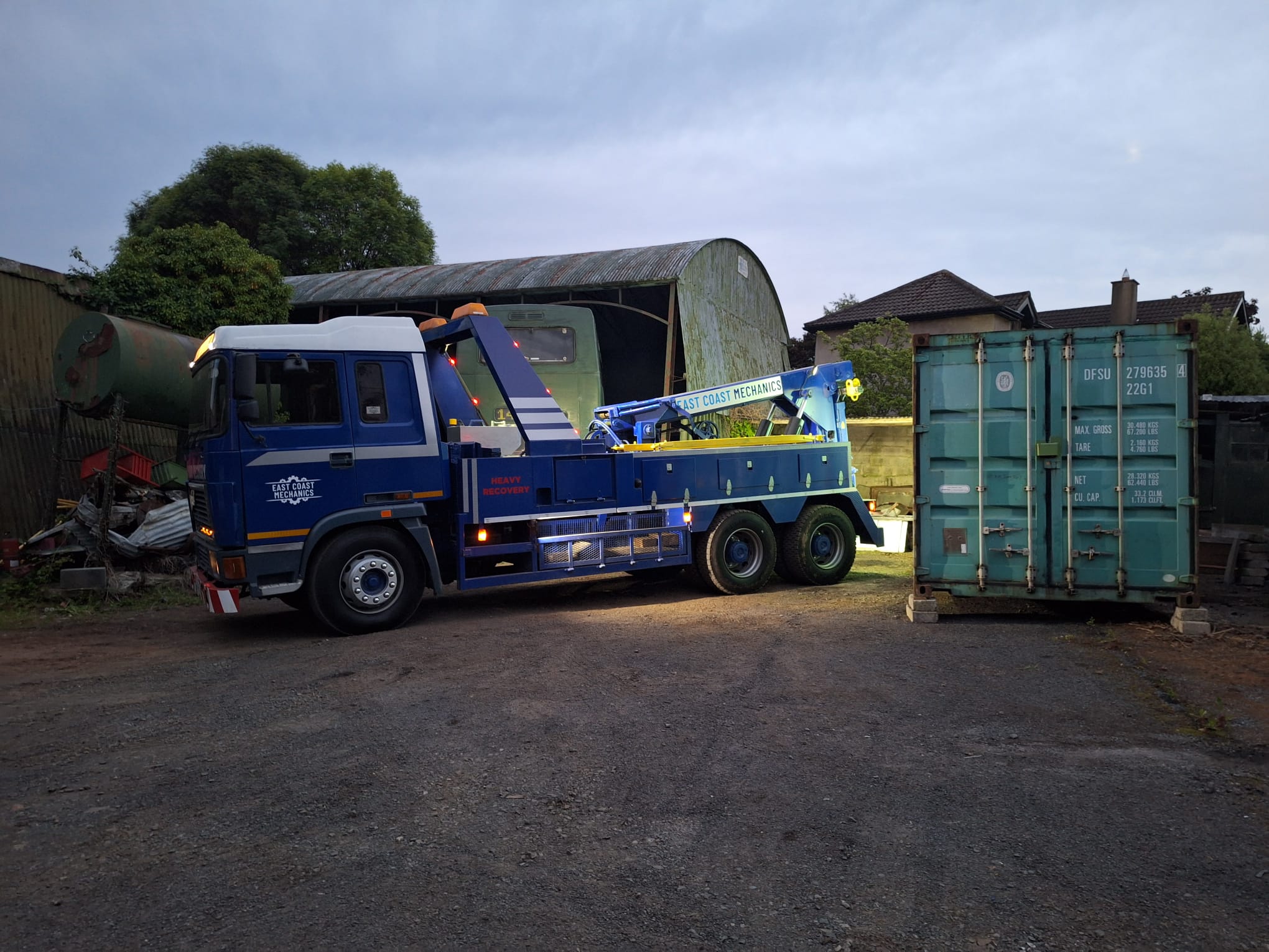 Low loader transporting plant and a non-running vehicle in Ireland nationwide